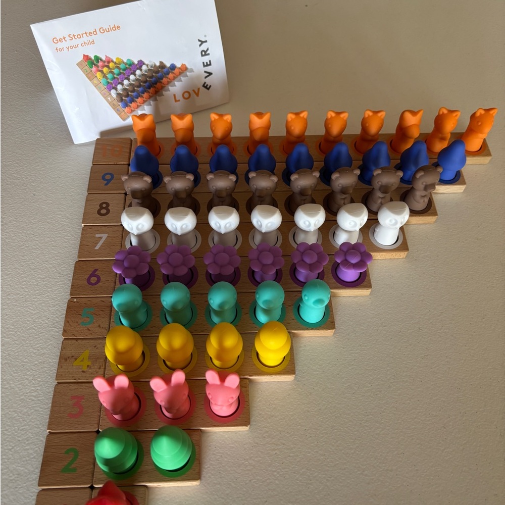 Lovevery Multi-Color Stacking Pegs and Play Set - Educational